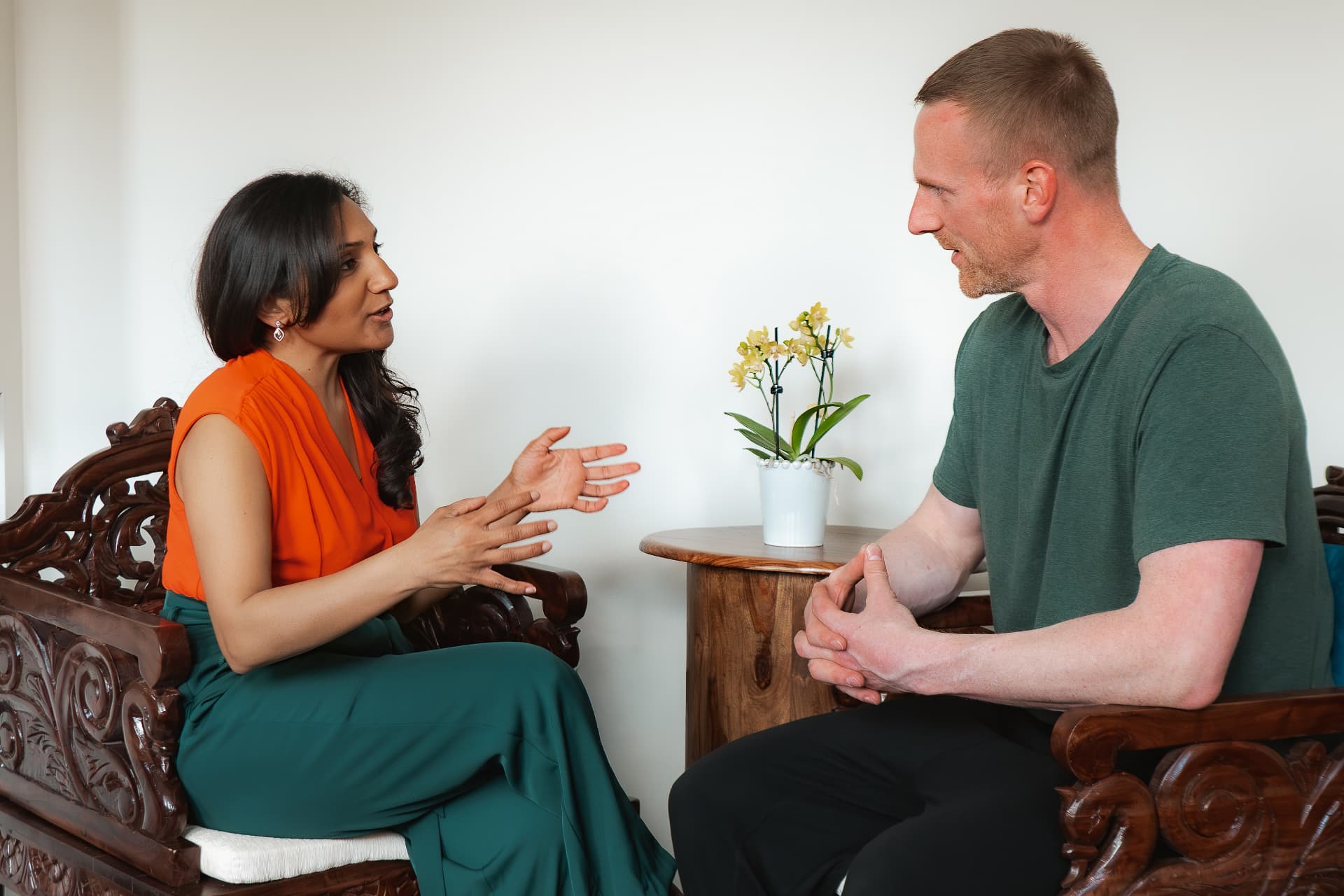 Miss Aparna Viswanath talking with a patient in clinic